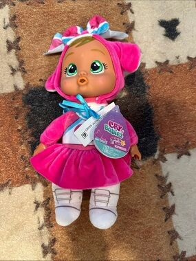 Cry Babies Plush Doll in Bright Pink Outfit with Bow